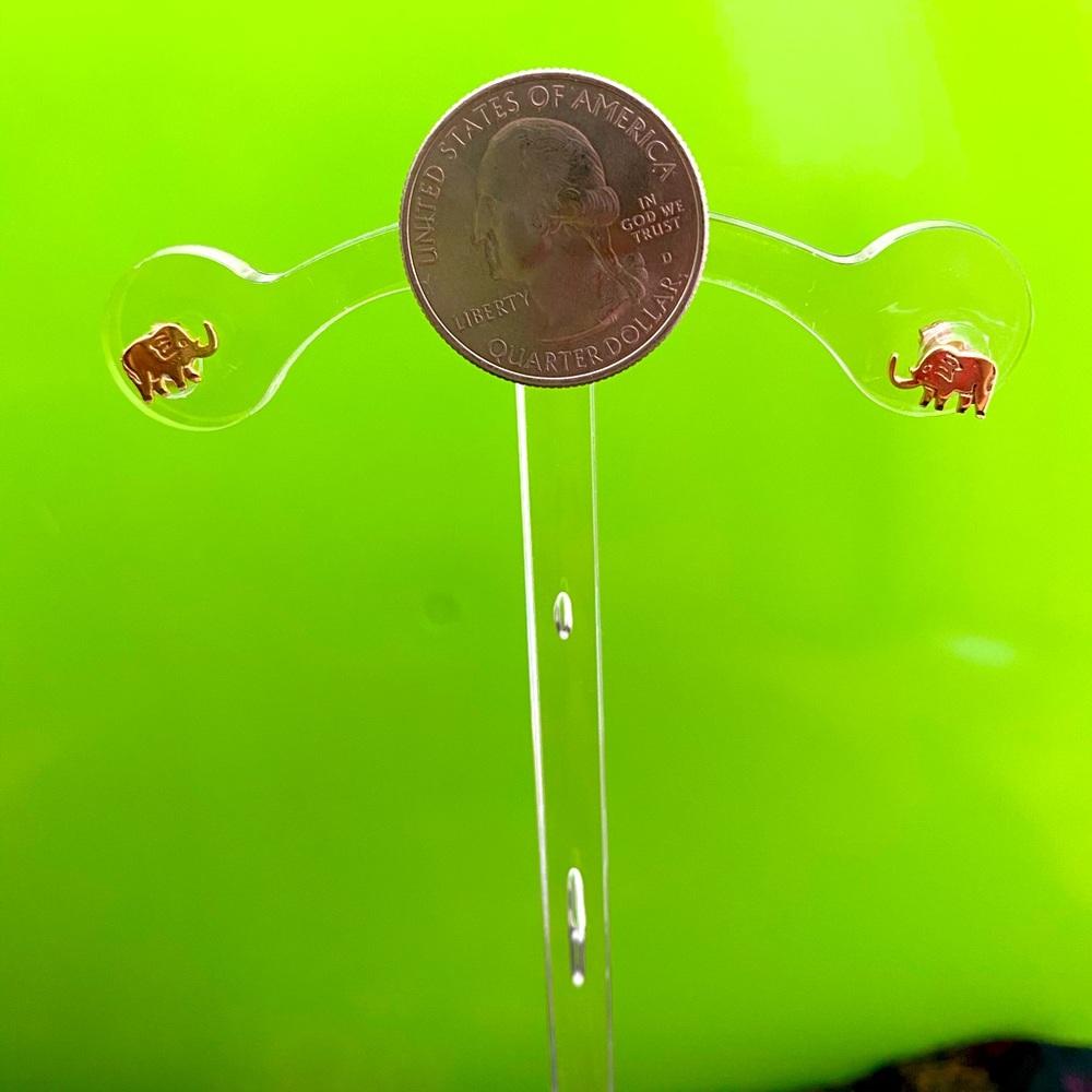 Dainty 14kt. Yellow gold elephant pierced earrings.